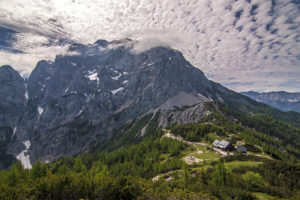 Postarski dom and peak of Prisojnik